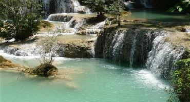 Visiter Randonnée à travers rizières et forêt : découverte des chutes de Kuangsi